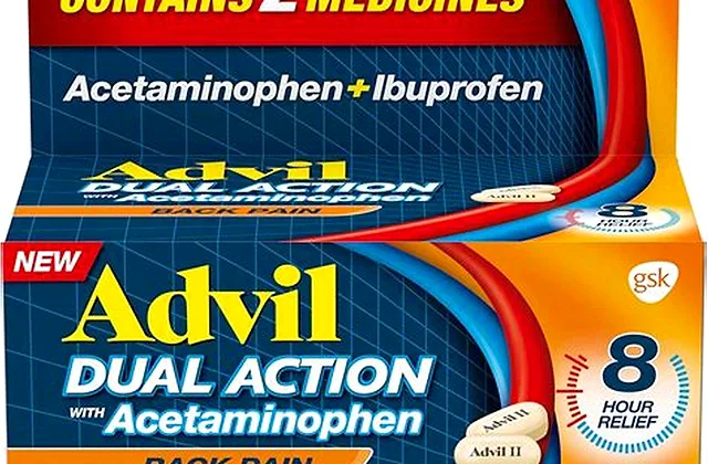 Tylenol acetaminophen tablets arranged next to a dosing guide