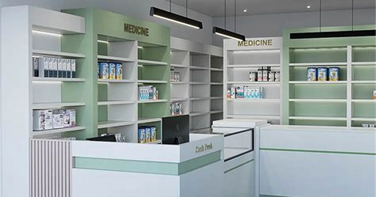 Tylenol on a pharmacy shelf illustrating who makes Tylenol and its parent company Kenvue
